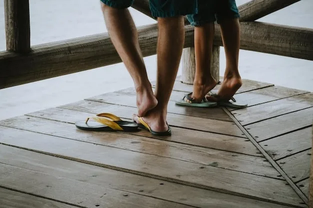 A close-up of a person's foot in a comfortable-looking SHEIN flat sandal, showcasing soft straps and a modest cushioned sole, walking on a boardwalk.