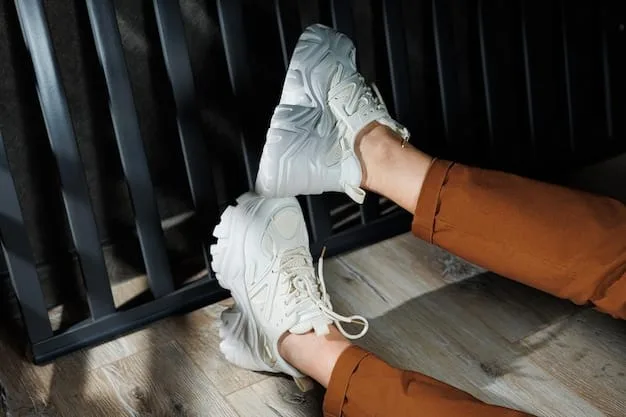 A close-up side view of a well-worn SHEIN sneaker, showing visible creasing on the synthetic upper and slight wear on the sole's edges, illustrating typical signs of use.