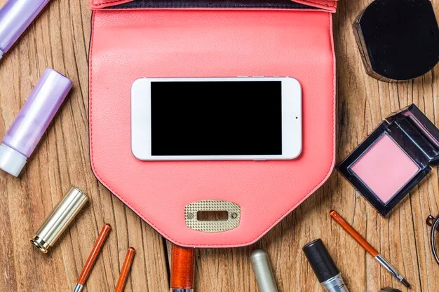 An open SHEIN crossbody bag, neatly organized with small clear pouches for makeup and tech, a slim cardholder, and a compact mirror, showing an efficient and clutter-free interior.