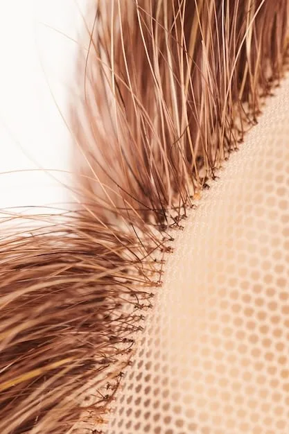 A detailed close-up of healthy hair ends contrasting with split ends, visually emphasizing the benefit of regular trims.