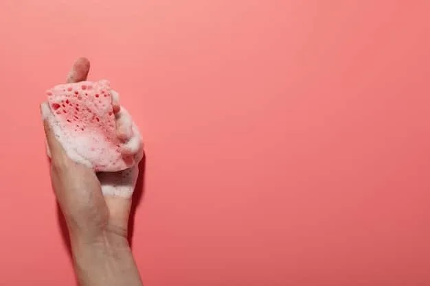 A person's hand gently touching a patch of irritated, red skin, visually representing eczema or psoriasis. The focus is on the skin texture and redness, not the person's face.
