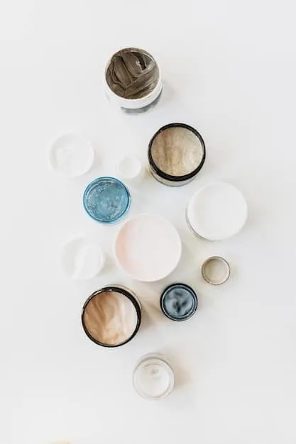 A close-up shot of a variety of skincare products specifically designed for oily and acne-prone skin, neatly arranged on a minimalist white background.