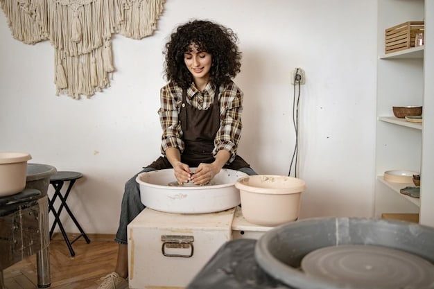 A sound recordist is carefully capturing the sounds of a traditional pottery-making process in a maker space. The artist is shaping clay on a wheel, with the microphone positioned to clearly record the sounds of the wheel turning and the artist's tools shaping the clay.