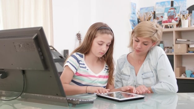 A parent and a teacher sitting at a table, discussing a student's progress and attendance record. They are looking at a tablet displaying data, collaborative and solution-oriented discussion.
