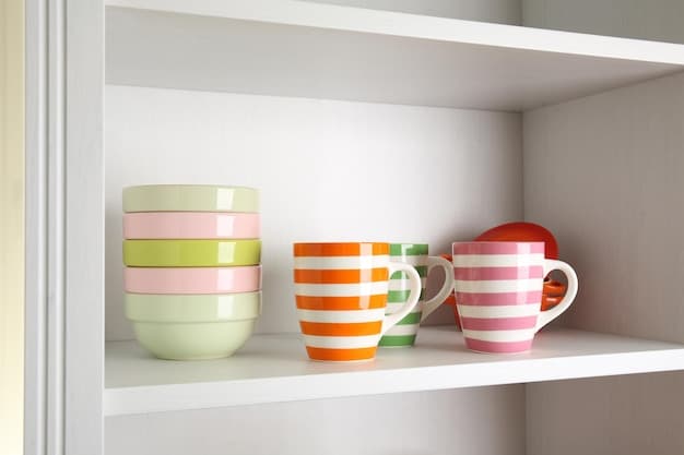 A stylishly organized small apartment kitchen corner with open shelving, displaying SHEIN Home ceramic mugs, small decorative bowls, and a compact spice rack, demonstrating efficient use of vertical space with a clean, cohesive design.