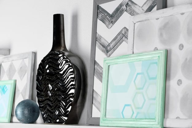 A close-up of a diverse collection of wall art and decorative elements from SHEIN, including framed abstract prints, a small macrame hanging, and a minimalist metal art piece, carefully laid out on a light wooden floor, ready to be arranged into a gallery wall.