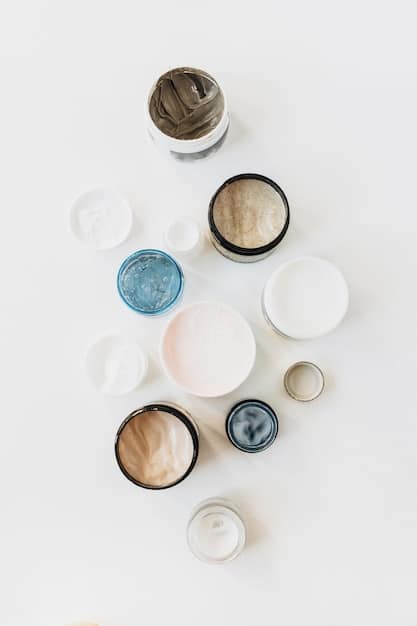 A close-up shot of a variety of skincare products specifically designed for oily and acne-prone skin, neatly arranged on a minimalist white background.
