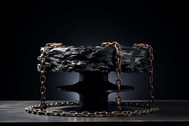 A stylish black faux leather shoulder bag featuring a prominent, chunky gold chain strap and heavy metallic hardware, placed on a dark, textured surface, highlighting its luxurious details.