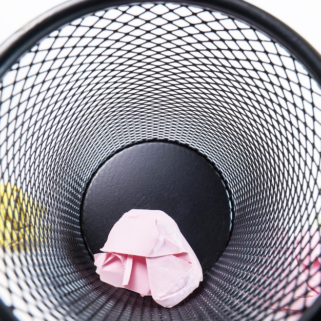 A close-up of a gentle cycle setting on a washing machine, with a mesh laundry bag visible inside.
