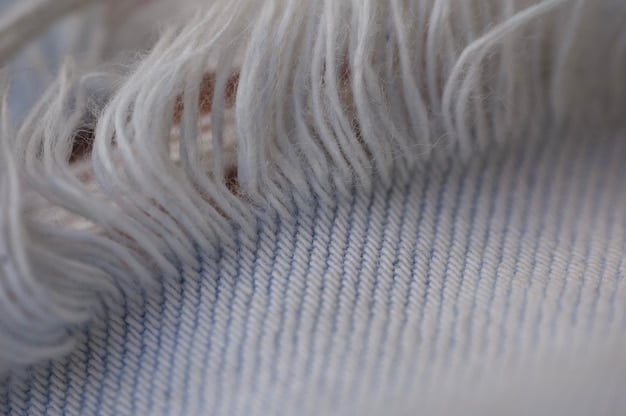 A detailed close-up of a high-quality fabric swatch with visible texture and threads, demonstrating the importance of examining fabric details online.