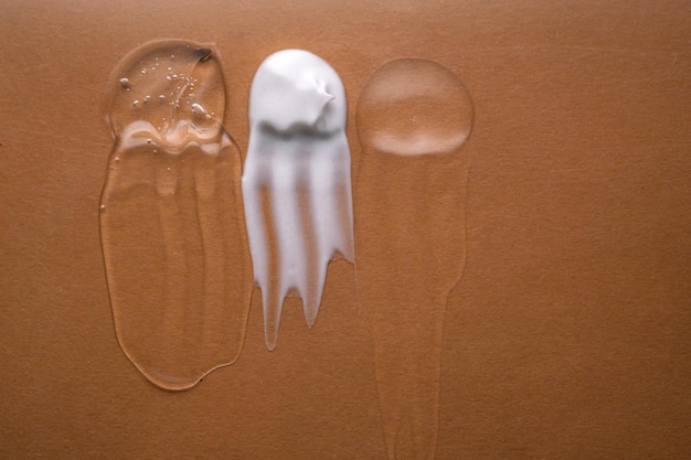 A split image showing a mineral sunscreen texture on one side (thick, white) and a chemical sunscreen on the other (clear, sheer), illustrating the visual and textural differences.